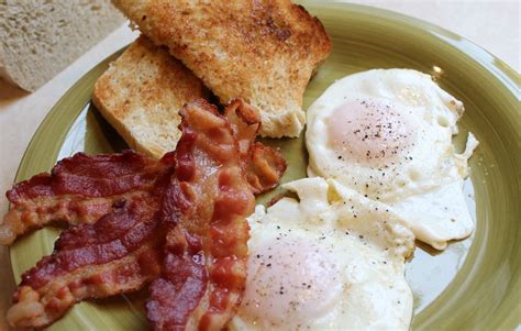 4 Item Hot Breakfast (2 eggs, 2 slices bacon, 1 sausage patty, hashbrowns, coffee) - calories, carbs, nutrition