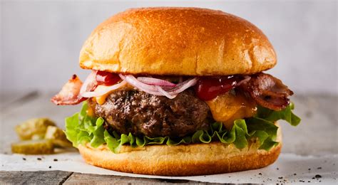 How does 100% Irish Beef Burger and served on a Toasted Bun fit into your Daily Goals - calories, carbs, nutrition