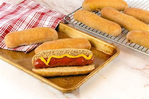 How does 100% Whole Wheat Hot Dog Buns fit into your Daily Goals - calories, carbs, nutrition