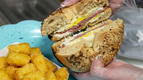 How does 155 Sunrise Bagel with Ham & Cheese fit into your Daily Goals - calories, carbs, nutrition