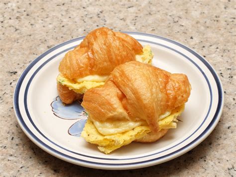 How does 155 Sunrise Croissant with Egg & Cheese fit into your Daily Goals - calories, carbs, nutrition