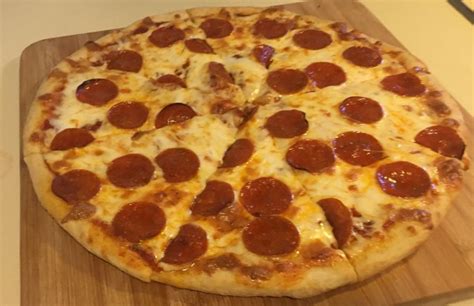 How does 16'' Pepperoni Pizza fit into your Daily Goals - calories, carbs, nutrition