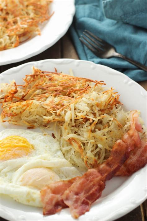 How does 2 Eggs, Hashbrowns & 2 White Toast fit into your Daily Goals - calories, carbs, nutrition