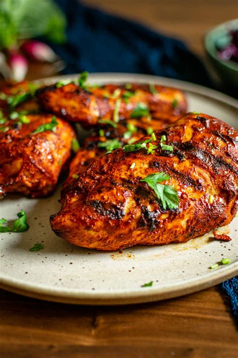 How does Achiote Marinated Chicken fit into your Daily Goals - calories, carbs, nutrition