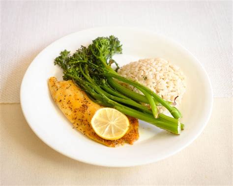 How does Almond Crusted Tilapia with Red Pepper Confit, Broccolini and Sweet Potato Gratin fit into your Daily Goals - calories, carbs, nutrition