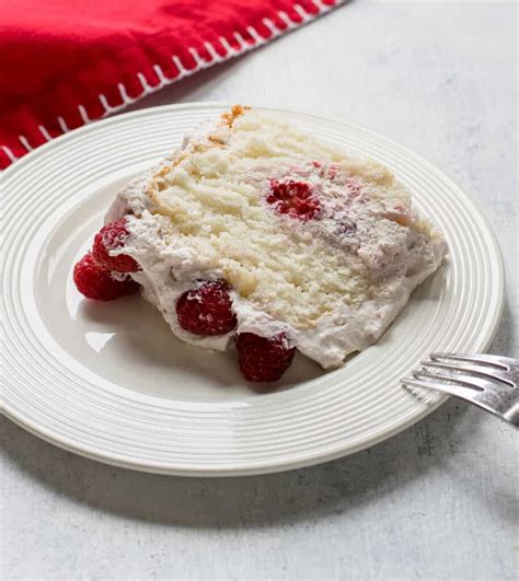 How does Angel Food Cake Roulade with Raspberries and Almond Mousse fit into your Daily Goals - calories, carbs, nutrition