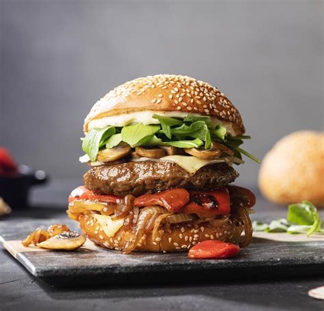 How does Angus Beef Burger (94936.6) fit into your Daily Goals - calories, carbs, nutrition