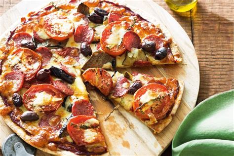 How does Antipasto Pizza - small fit into your Daily Goals - calories, carbs, nutrition