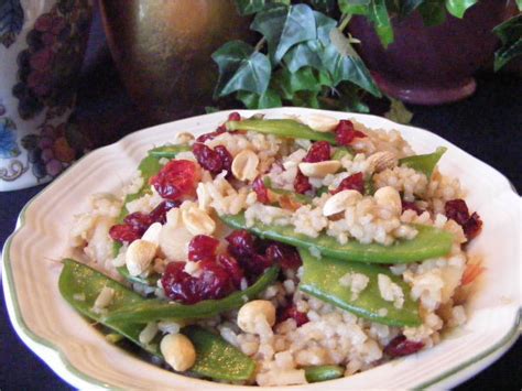 How does Asian Brown Rice and Peanut Salad Toss fit into your Daily Goals - calories, carbs, nutrition