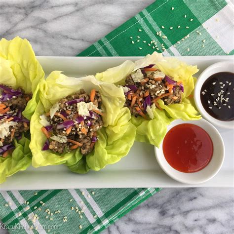 How does Asian Lettuces Wrap with egg roll fit into your Daily Goals - calories, carbs, nutrition