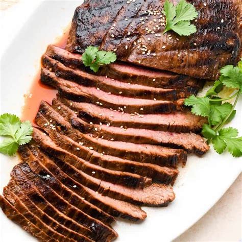 How does Asian Marinated Flank Steak fit into your Daily Goals - calories, carbs, nutrition