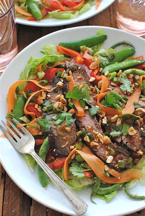 How does Asian Steak Salad Plate fit into your Daily Goals - calories, carbs, nutrition