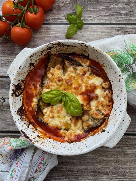 How does Aubergine Parmigiana fit into your Daily Goals - calories, carbs, nutrition