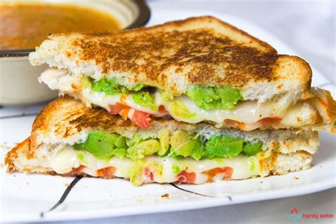 How does Avocado, White Cheddar Tomato Grilled Cheese fit into your Daily Goals - calories, carbs, nutrition