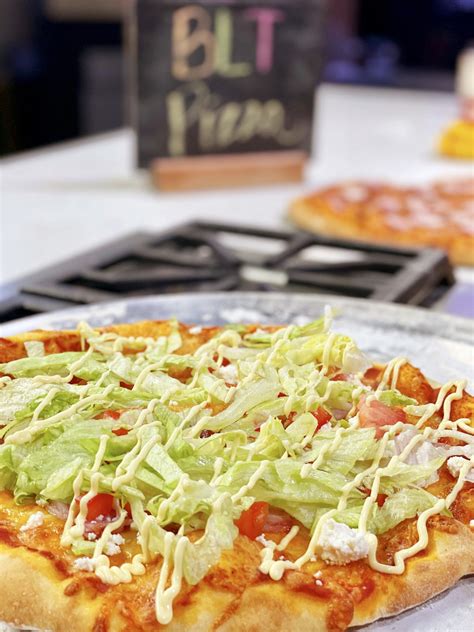 How does BLT Pizza fit into your Daily Goals - calories, carbs, nutrition