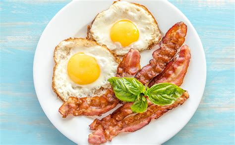 How does Bacon, Egg & Cheese English Muffin fit into your Daily Goals - calories, carbs, nutrition