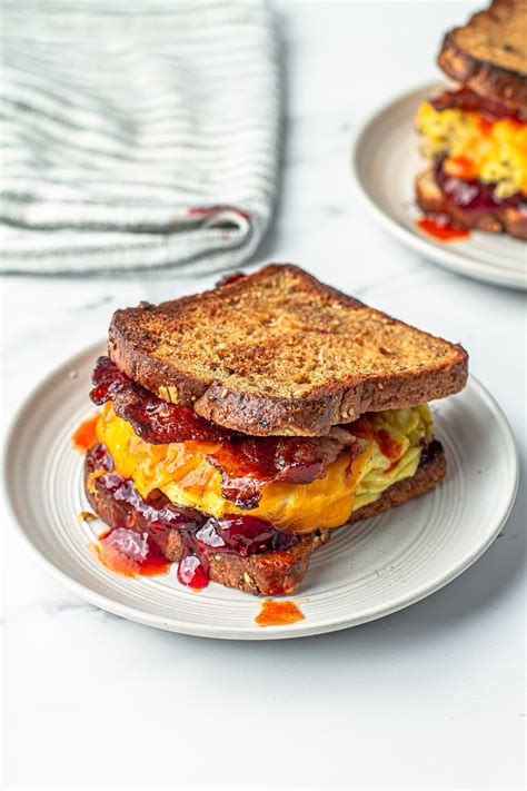 How does Bacon, Egg and Cheese on Wheat Toast fit into your Daily Goals - calories, carbs, nutrition