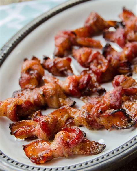 How does Bacon 22/26 Cooked Maple Peppered 1 EA fit into your Daily Goals - calories, carbs, nutrition