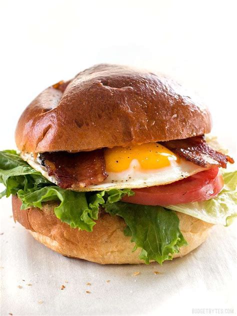 How does Bacon Breakfast Sandwich fit into your Daily Goals - calories, carbs, nutrition