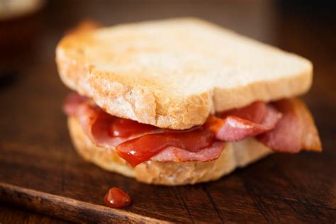 How does Bacon Sandwich - White Bread fit into your Daily Goals - calories, carbs, nutrition