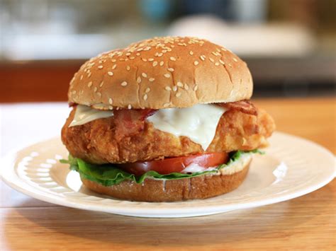 How does Bacon-Swiss Chicken Patty with French Fries and a 20oz Fountain Beverage fit into your Daily Goals - calories, carbs, nutrition