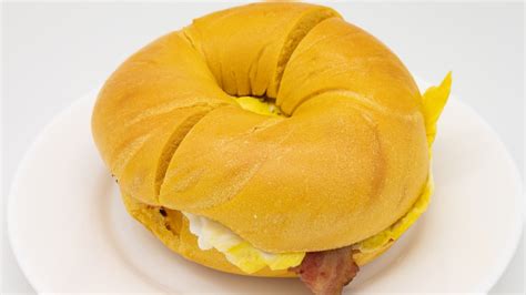 How does Bagel with Egg & Bacon fit into your Daily Goals - calories, carbs, nutrition