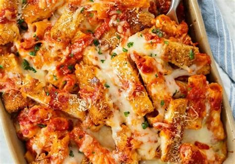 How does Baked Chicken Parmesan with Pasta and Baby Carrots fit into your Daily Goals - calories, carbs, nutrition