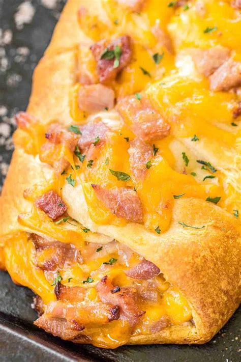 How does Baked Ham, Cheddar Cheese & Mustard Mayonnaise Baguette fit into your Daily Goals - calories, carbs, nutrition
