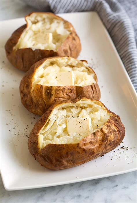 How does Baked Potato with Butter & Sour Cream fit into your Daily Goals - calories, carbs, nutrition