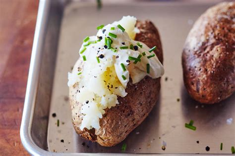 How does Baked Potatoes & Leeks in a Crisp Pastry Shell served with Steamed Peas & Carrots fit into your Daily Goals - calories, carbs, nutrition