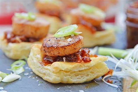 How does Baked Sea Scallops in Puff Pastry Cups with Bacon Crumbles and Spice Oil fit into your Daily Goals - calories, carbs, nutrition