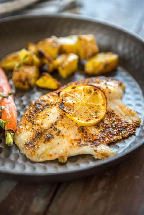 How does Baked Tilapia with Anchovy Lemon Butter fit into your Daily Goals - calories, carbs, nutrition