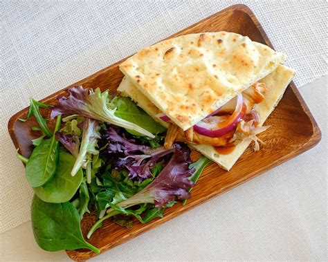 How does Bbq Chicken Flatbread Sandwich fit into your Daily Goals - calories, carbs, nutrition