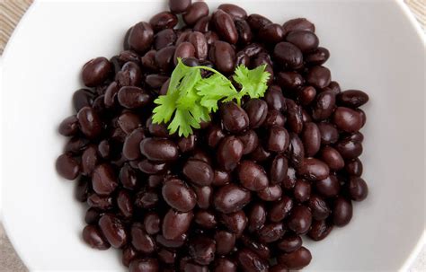 How does Beans Black Cooked Basic Method 1/2 Cup fit into your Daily Goals - calories, carbs, nutrition