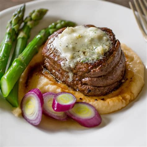 How does Beef Filet 5 oz Grilled Gorgonzola Crusted fit into your Daily Goals - calories, carbs, nutrition