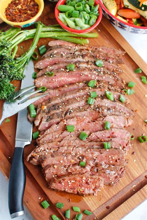 How does Beef Flank Asian Marinated 3 oz fit into your Daily Goals - calories, carbs, nutrition