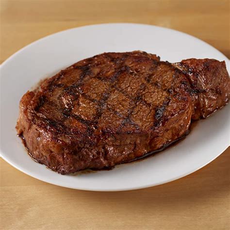 How does Beef Ribeye Grilled 12 oz fit into your Daily Goals - calories, carbs, nutrition