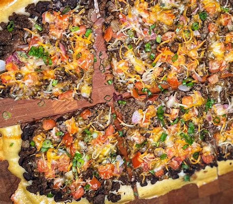 How does Beef Taco Pizza (32799.4) fit into your Daily Goals - calories, carbs, nutrition