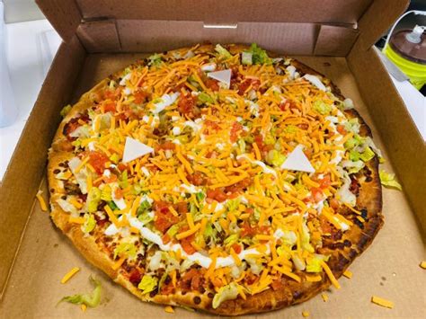 How does Beef Taco Pizza (34238.576) fit into your Daily Goals - calories, carbs, nutrition