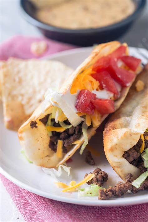 How does Beef Taco on Flour Tortilla fit into your Daily Goals - calories, carbs, nutrition