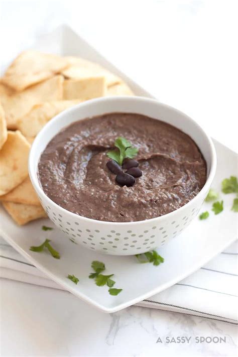 How does Black Bean Hummus with Pita and Compote fit into your Daily Goals - calories, carbs, nutrition