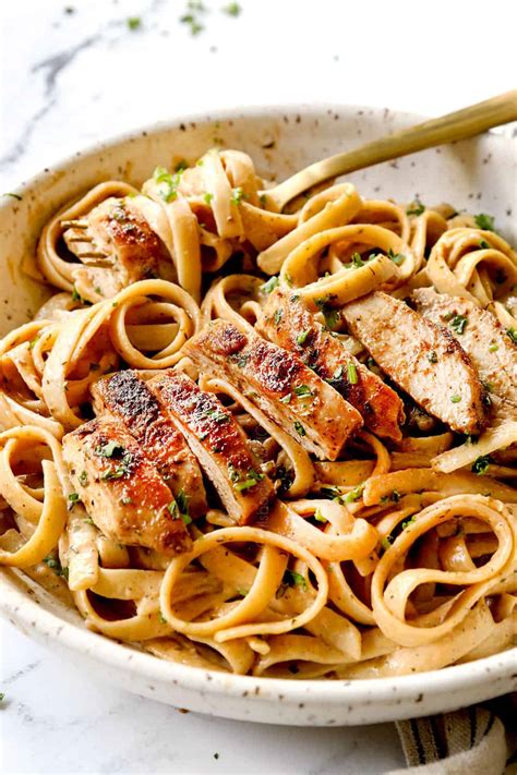 How does Blackened Chicken Tender Alfredo with Fettuccini fit into your Daily Goals - calories, carbs, nutrition