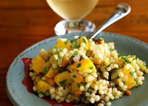 How does Blackened Chicken with Israel Couscous Roast Butternut Squash with Preserved Lemon, Herb Roasted Tom fit into your Daily Goals - calories, carbs, nutrition