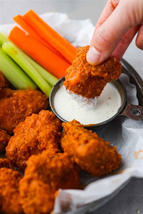 How does Blue Cheese Fondue Wings (Boneless) fit into your Daily Goals - calories, carbs, nutrition