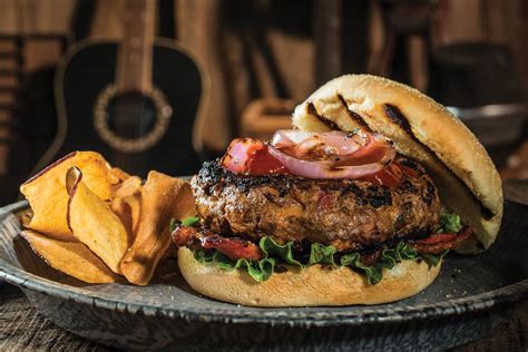 How does Blue Ribbon Cheddar BBQ Angus Burger fit into your Daily Goals - calories, carbs, nutrition