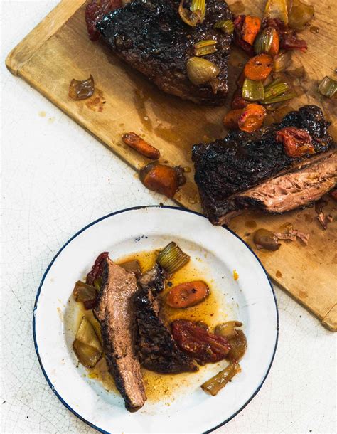 How does Braised Brisket with Bourbon Peach Glaze fit into your Daily Goals - calories, carbs, nutrition