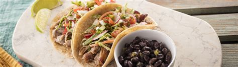 How does Braised Pork Tacos with Chipotle Coleslaw and Black Beans fit into your Daily Goals - calories, carbs, nutrition