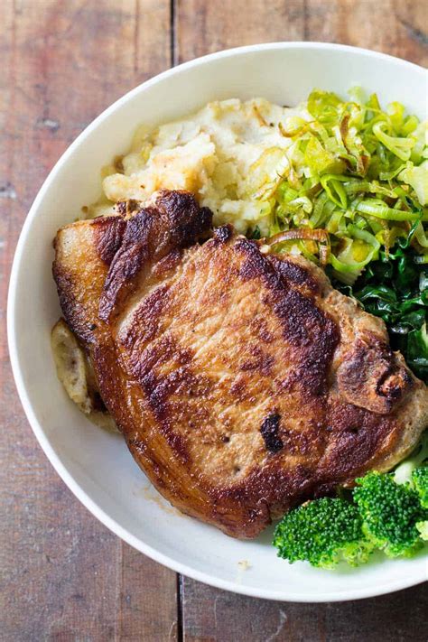 How does Breaded Pork Chops with Smashed potato and vegetable fit into your Daily Goals - calories, carbs, nutrition