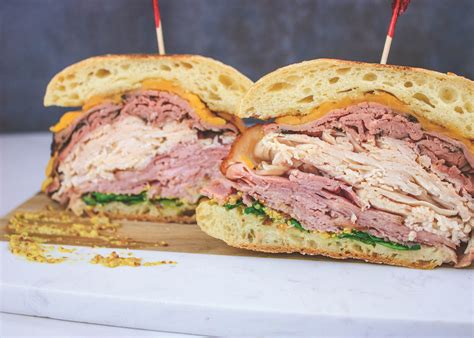 How does Broadway Deli Triple Threat Sandwich fit into your Daily Goals - calories, carbs, nutrition