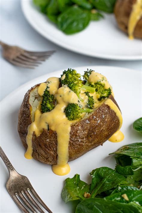 How does Broccoli, Cheddar and Bacon Stuffed Potato fit into your Daily Goals - calories, carbs, nutrition